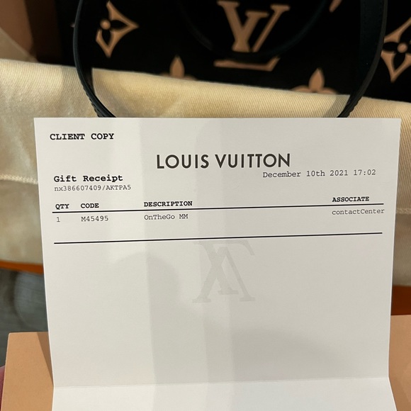 LV on the go black and cream MM Only one on Poshmark this bag  very hard to find - Picture 16 of 16
